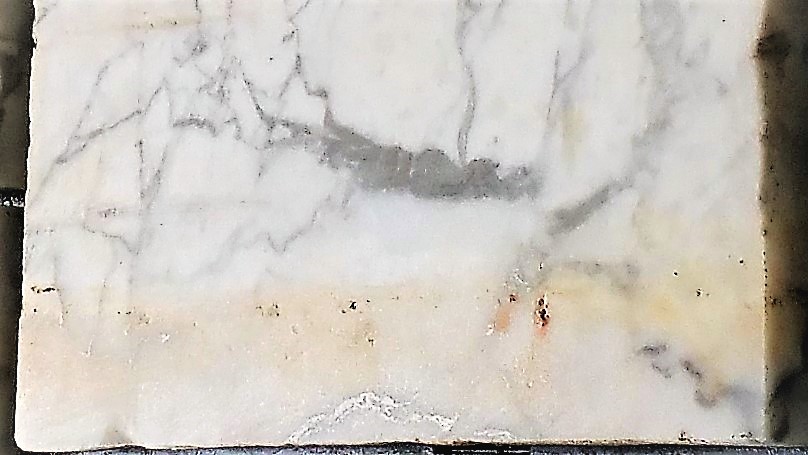EXAMPLE OF A PIECE OF MARBLE WITH YELLOW (IRON) STAINING