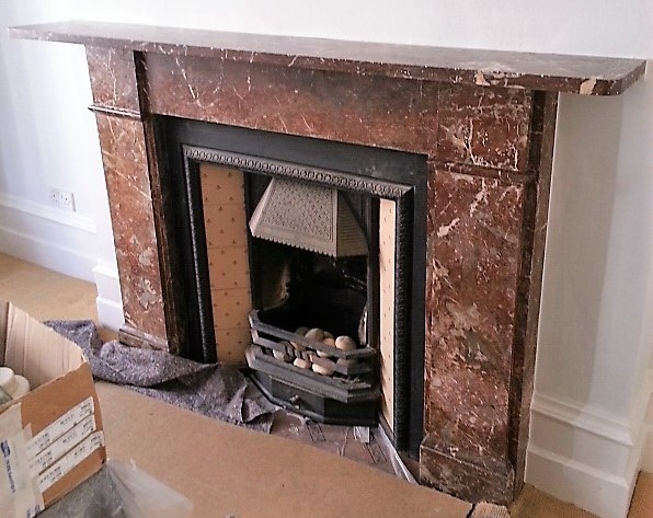 CLEANED, REPAIRED AND POLISHED ROSSO LEVANTO FIREPLACE