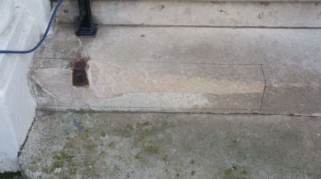 The Portland Step with the damaged are area marked out to be cut away