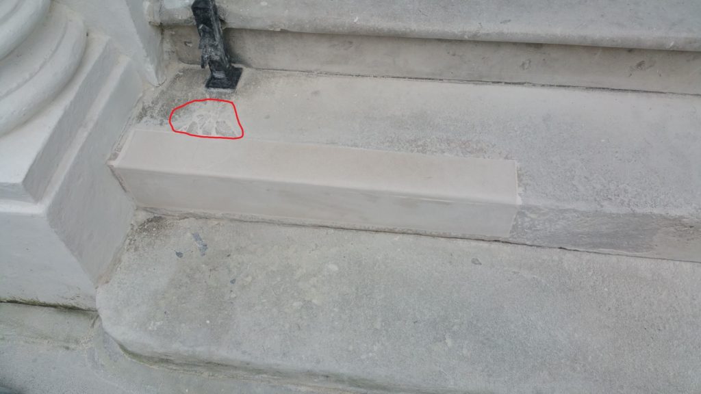 The piece of Portland Limestone is fixed in place with Megapoxy