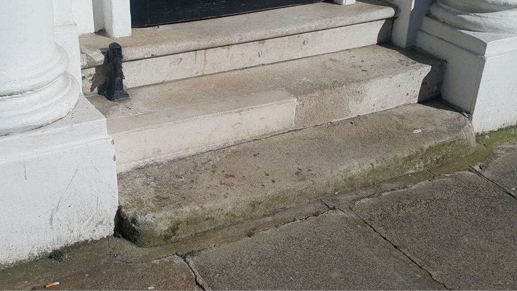 The patch repaired Portland Limestone Step 4 years later.