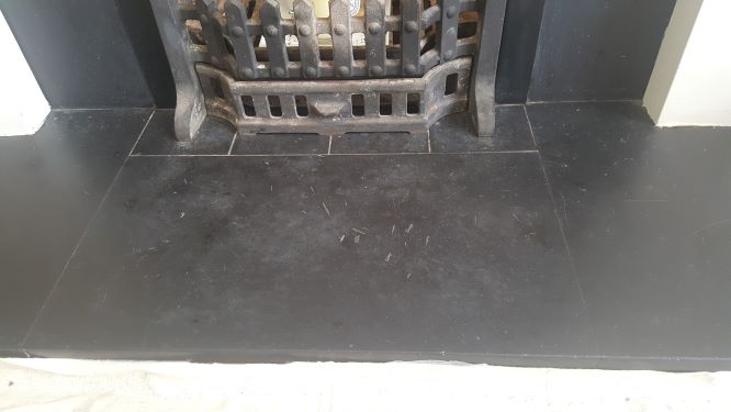 Chipped & Scratched Grey Slate Hearth