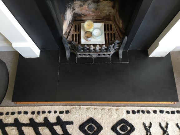 Damaged hearth, repaired, cleaned & sealed