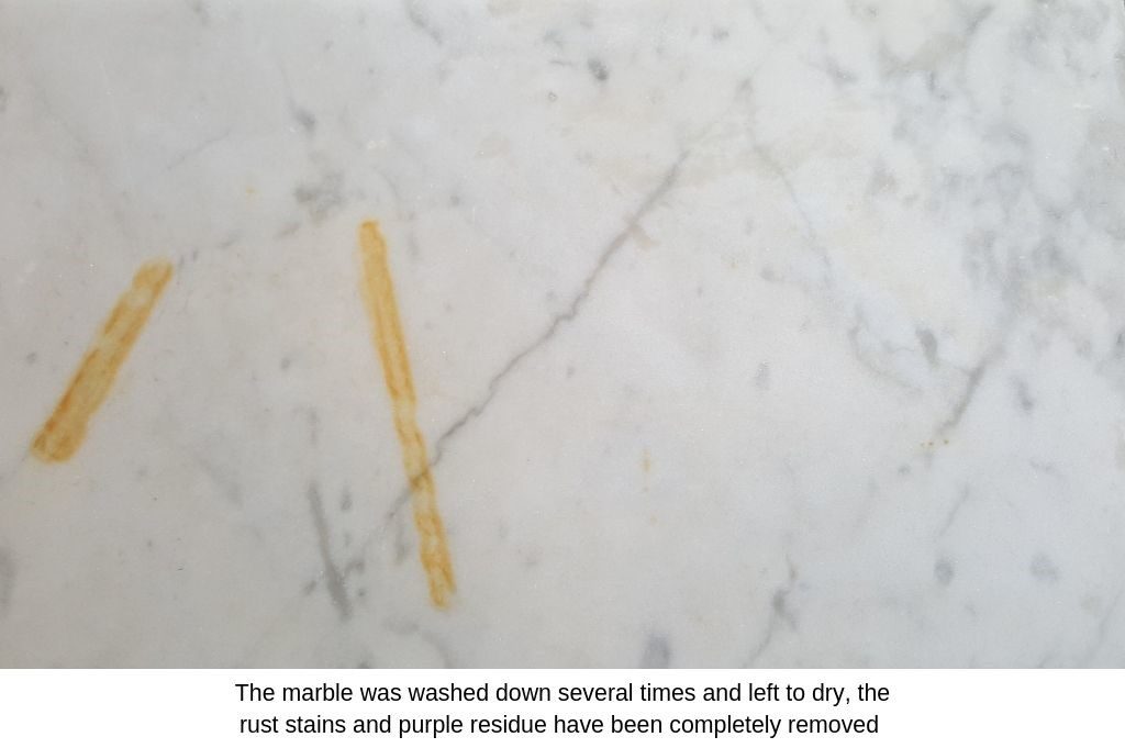 A piece of marble with the rust stains removed